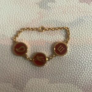 Etro Gold Bracelet with Red Zodiac Charms